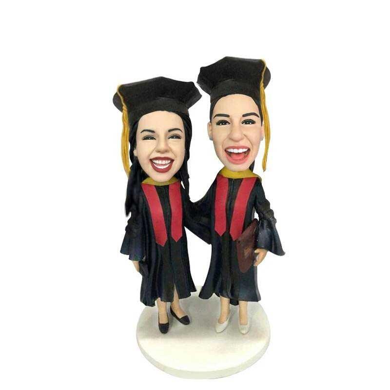Personalized best friends graduate together smiling bobblehead dolls